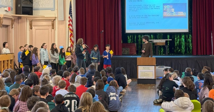 Braeden answering student questions at Main Street School